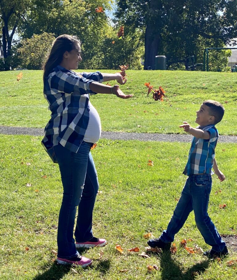 Pregnant woman with young child